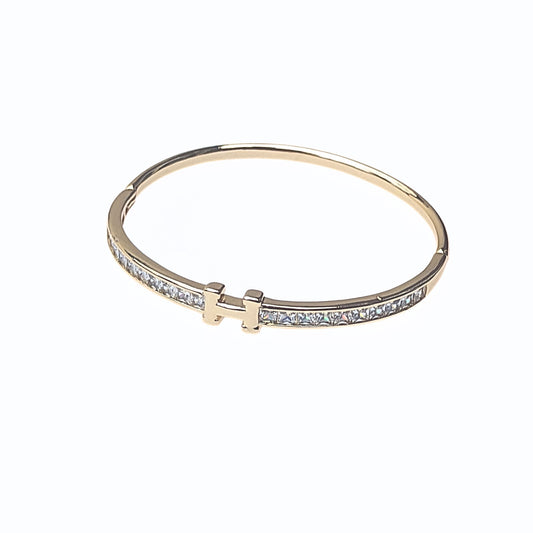 Slim gold plated bangle with crystal insets