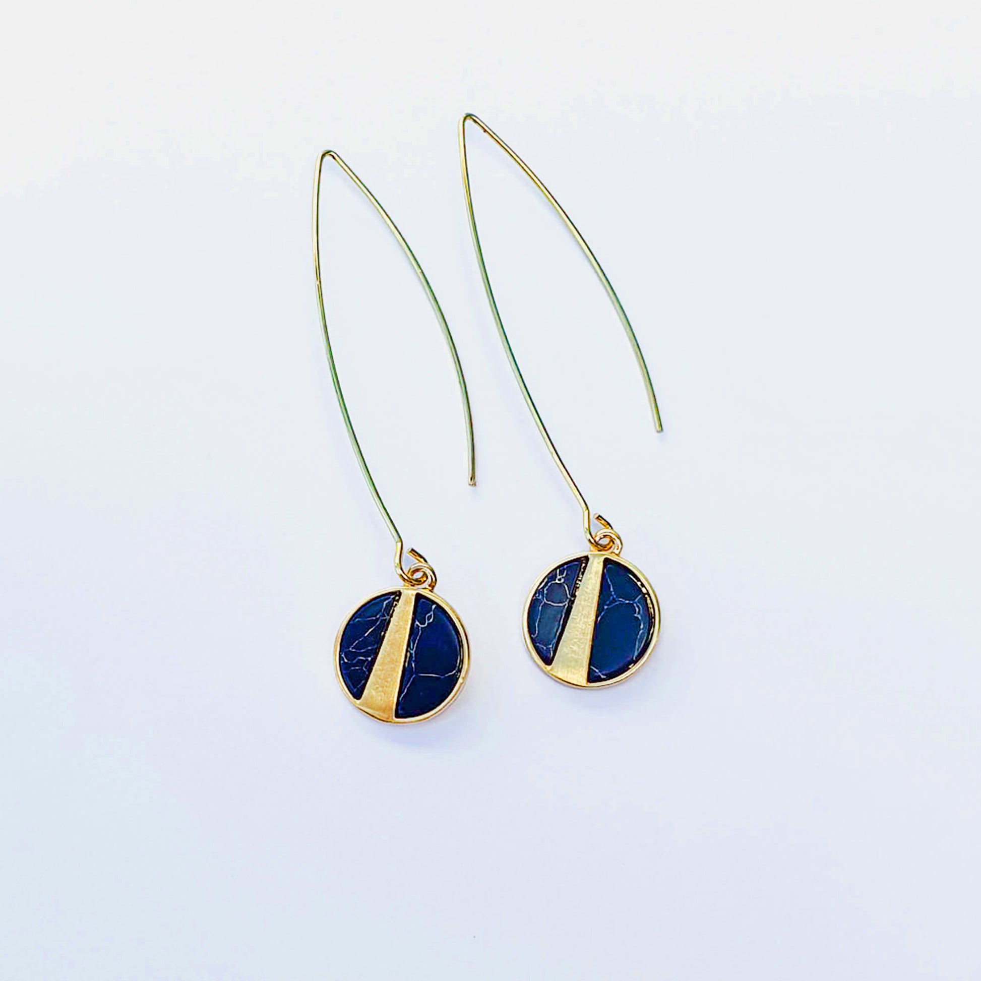 Marbled navy stone discs in gold plate on long oval earwires