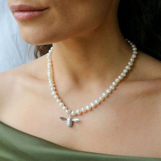 White freshwater pearls and cz bee necklace