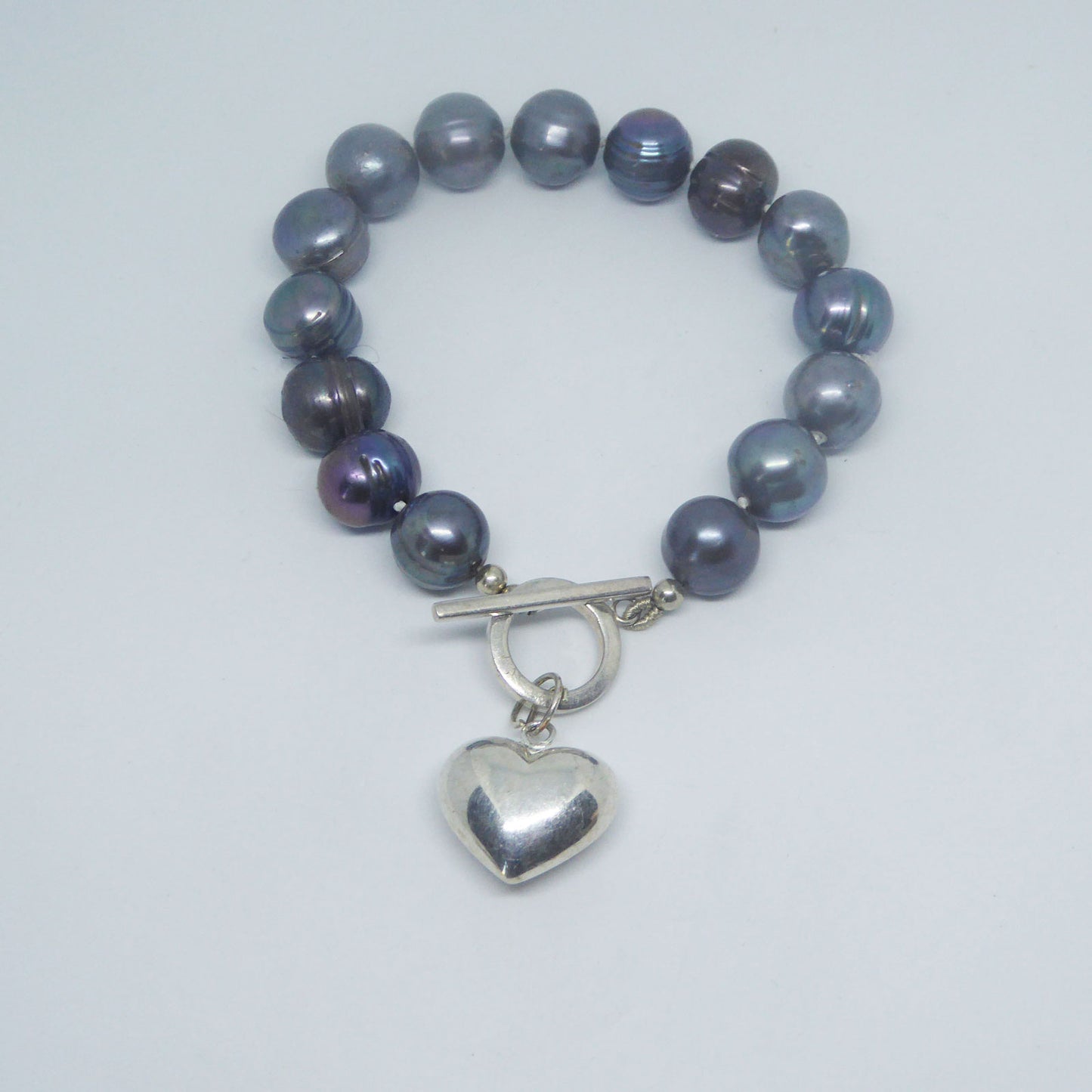 Peacock freshwater pearls & silver heart charm