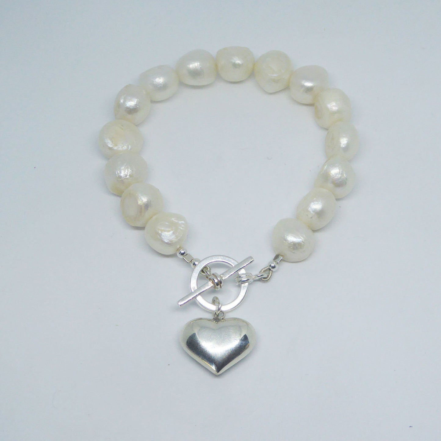 White freshwater pearls & silver heart charm