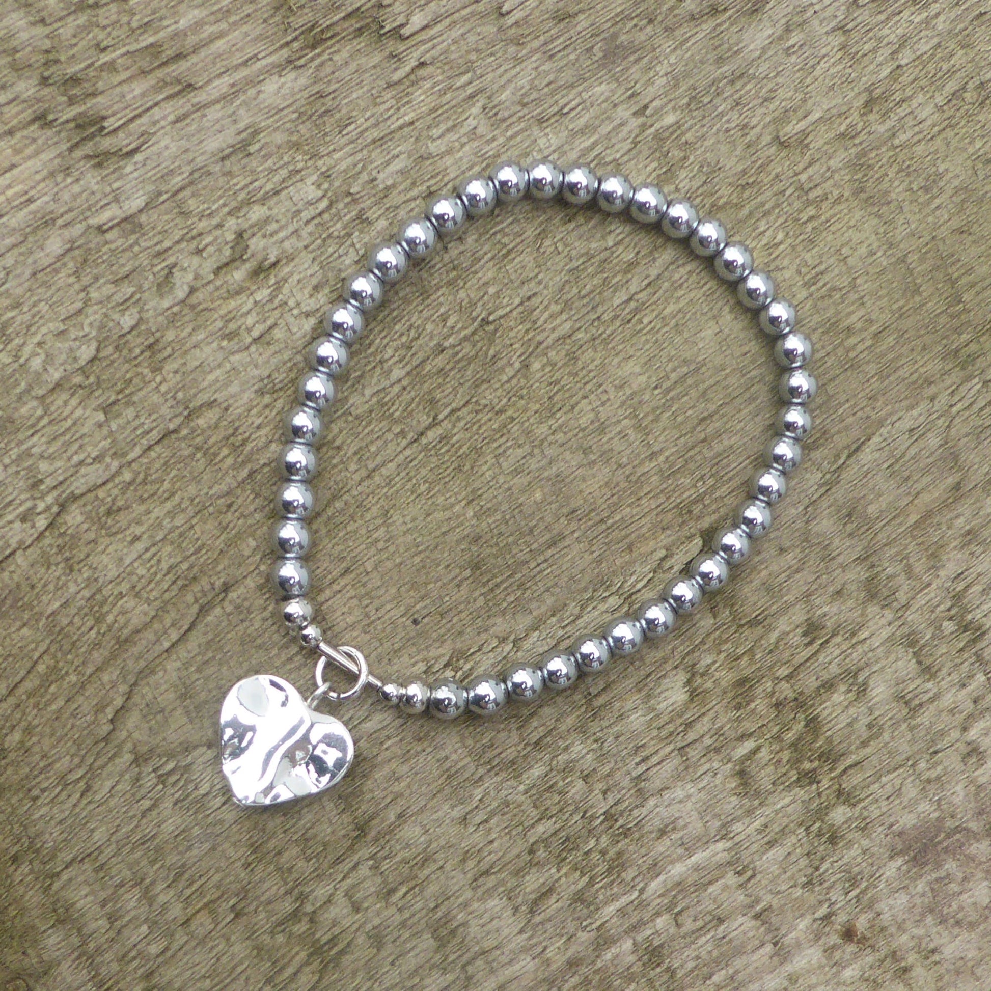 Wavy heart charm bracelet