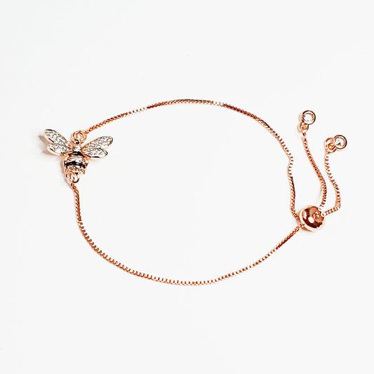 Gold plated bee charm set on a plated chain with an adjustable slider clasp