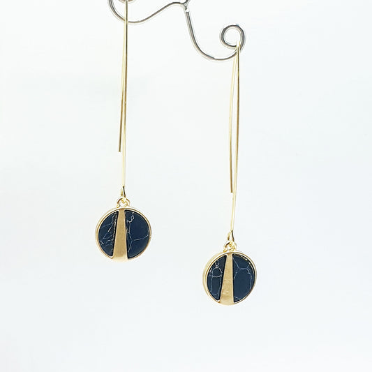 Marbled black discs in gold plate on long oval earwires