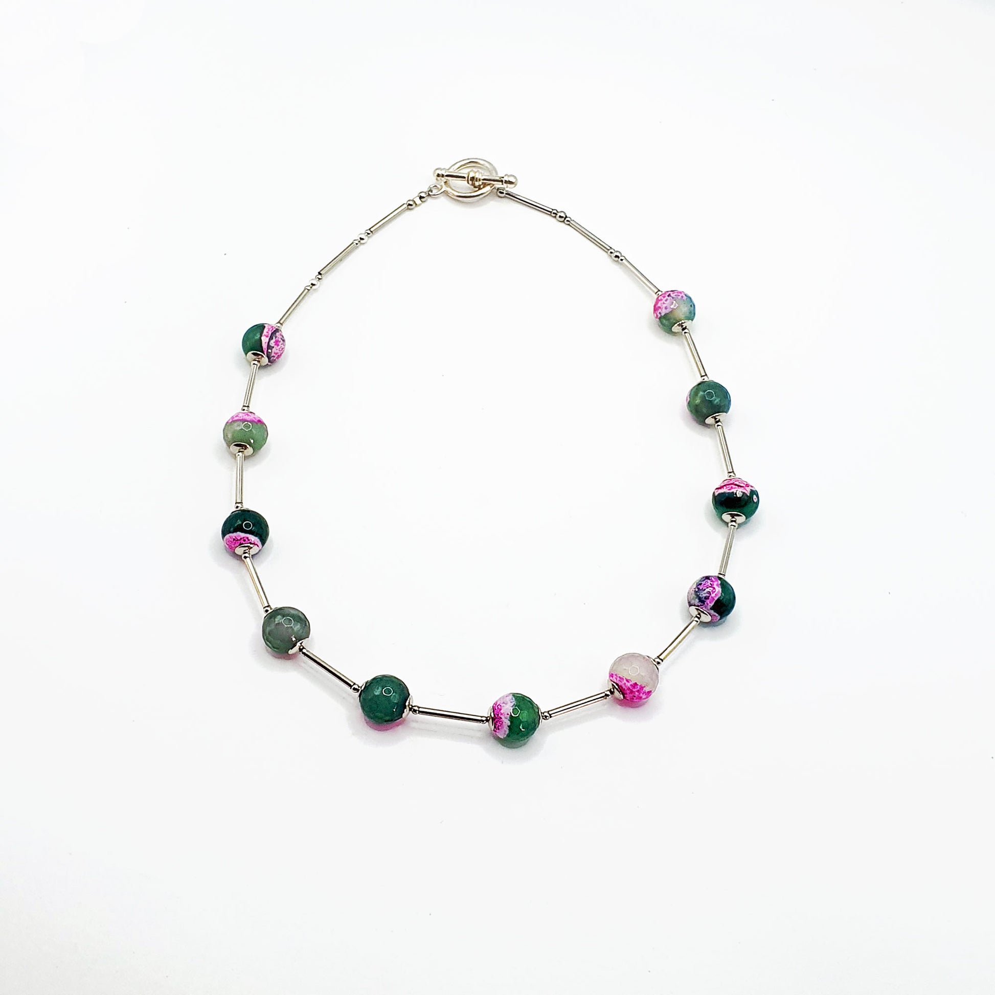 Orb style necklace in pink and green fuchsia faceted agate