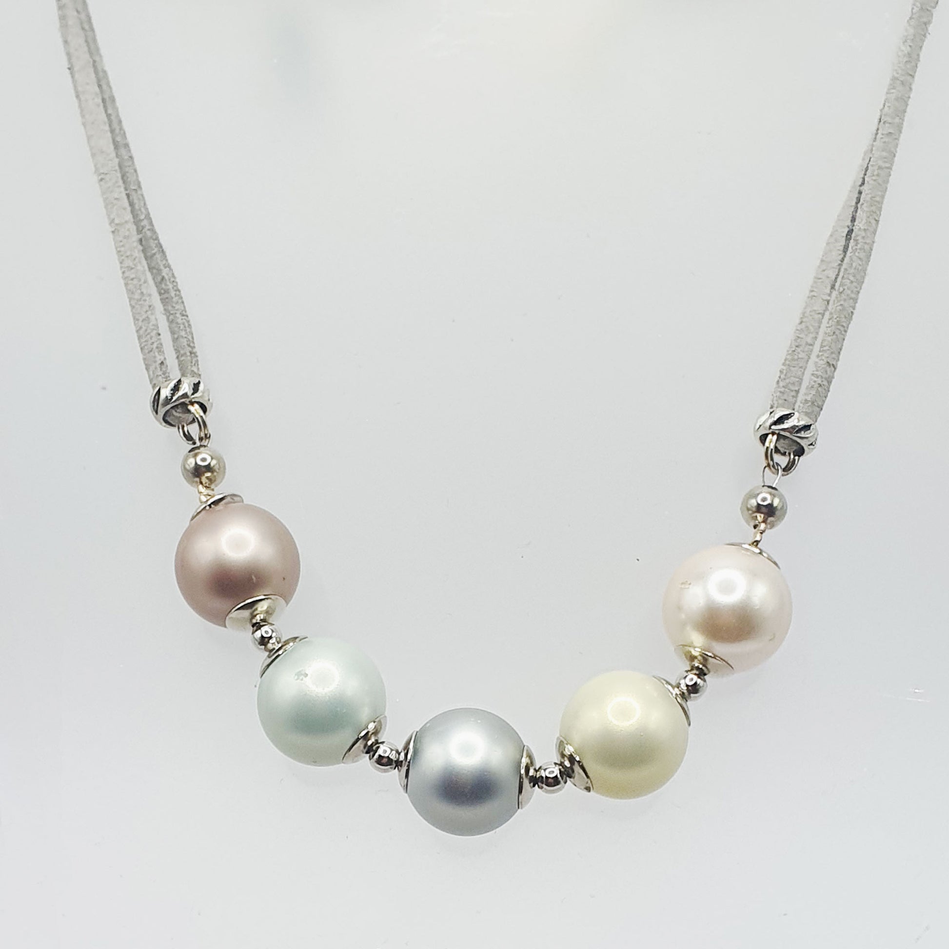 Glass pearl crescent necklace in pastel tones