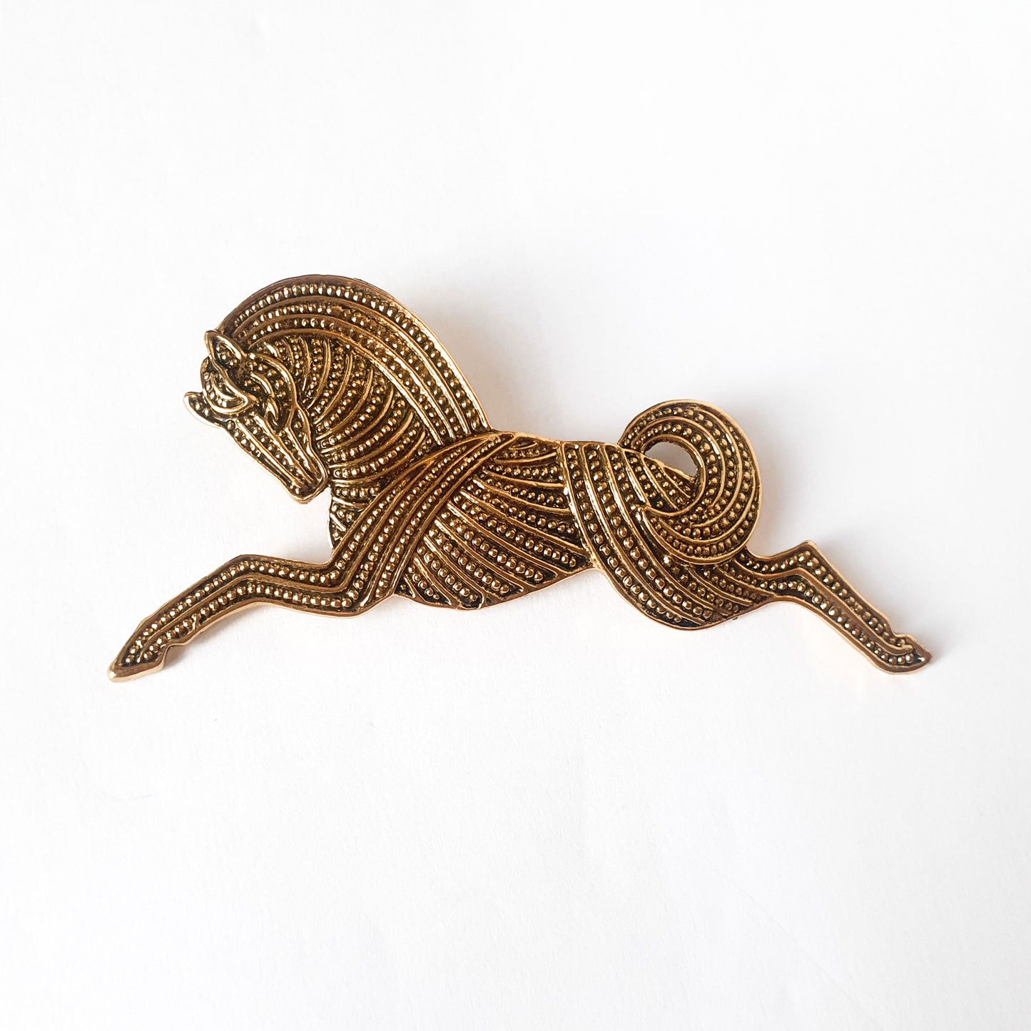 Gold colour  leaping horse brooch