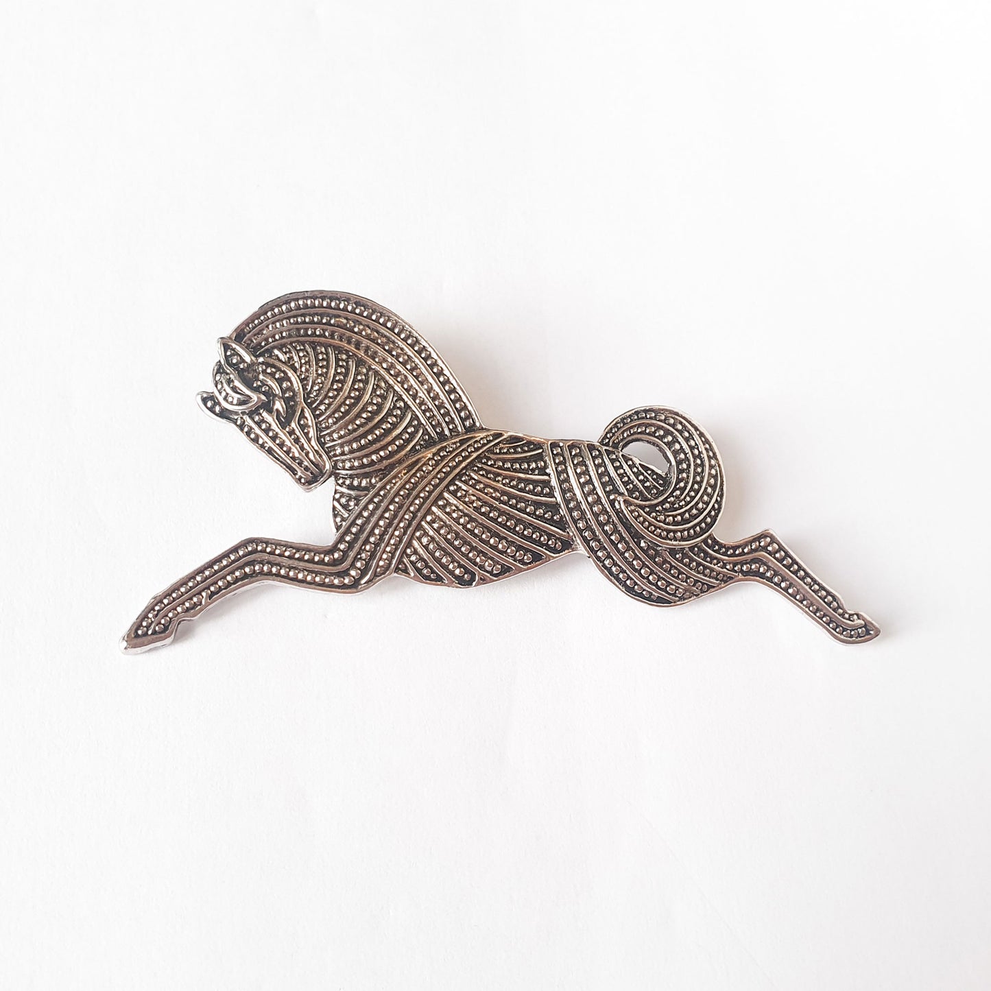 Silver colour  leaping horse brooch