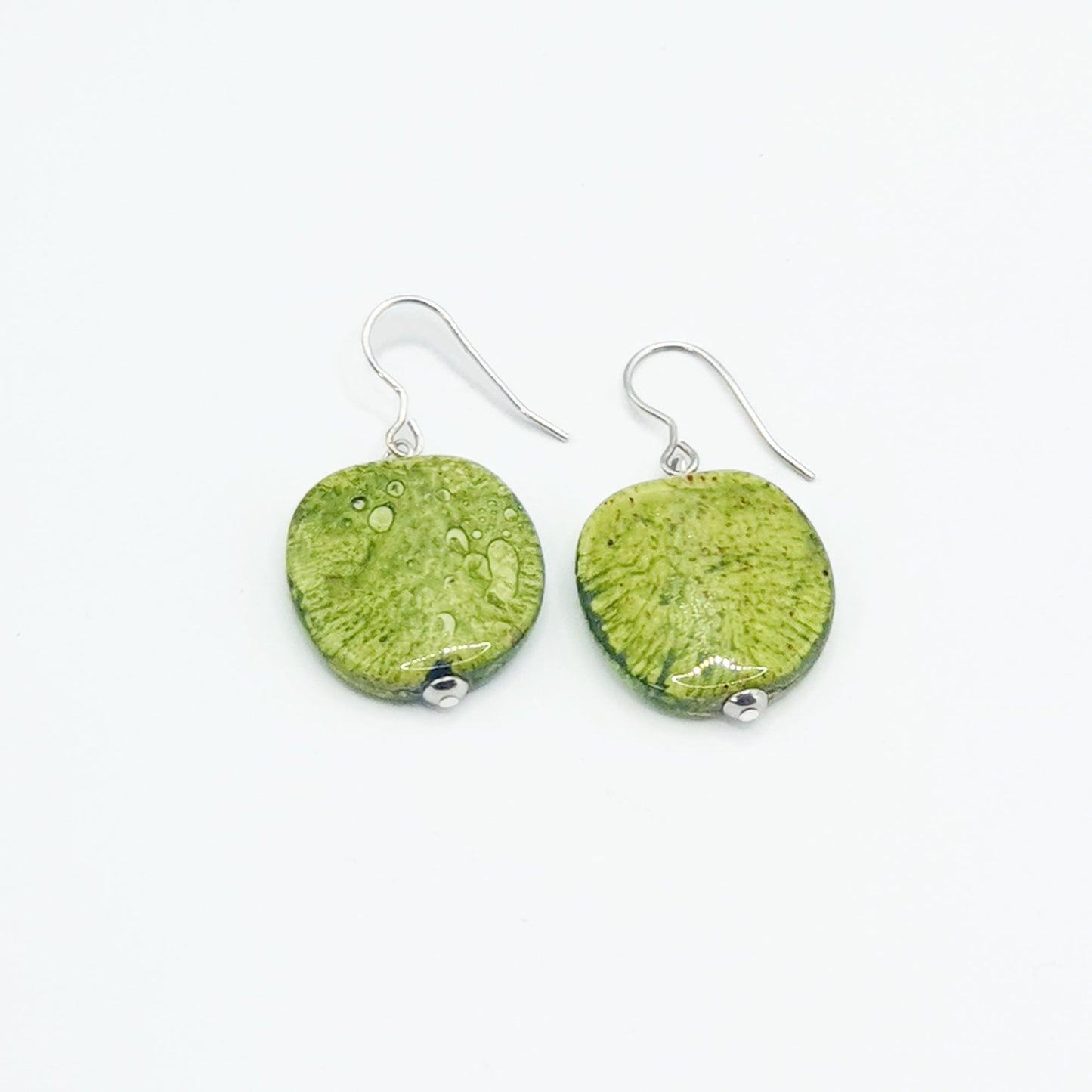 Resin pebble earrings in green