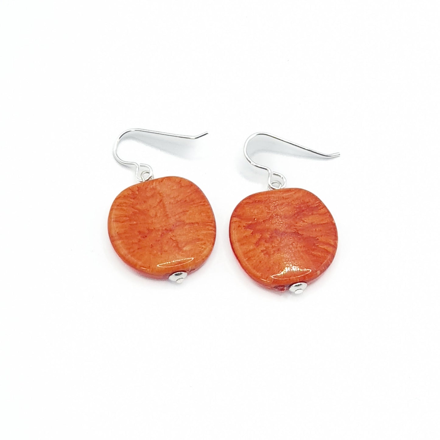 Resin pebble earrings in orange