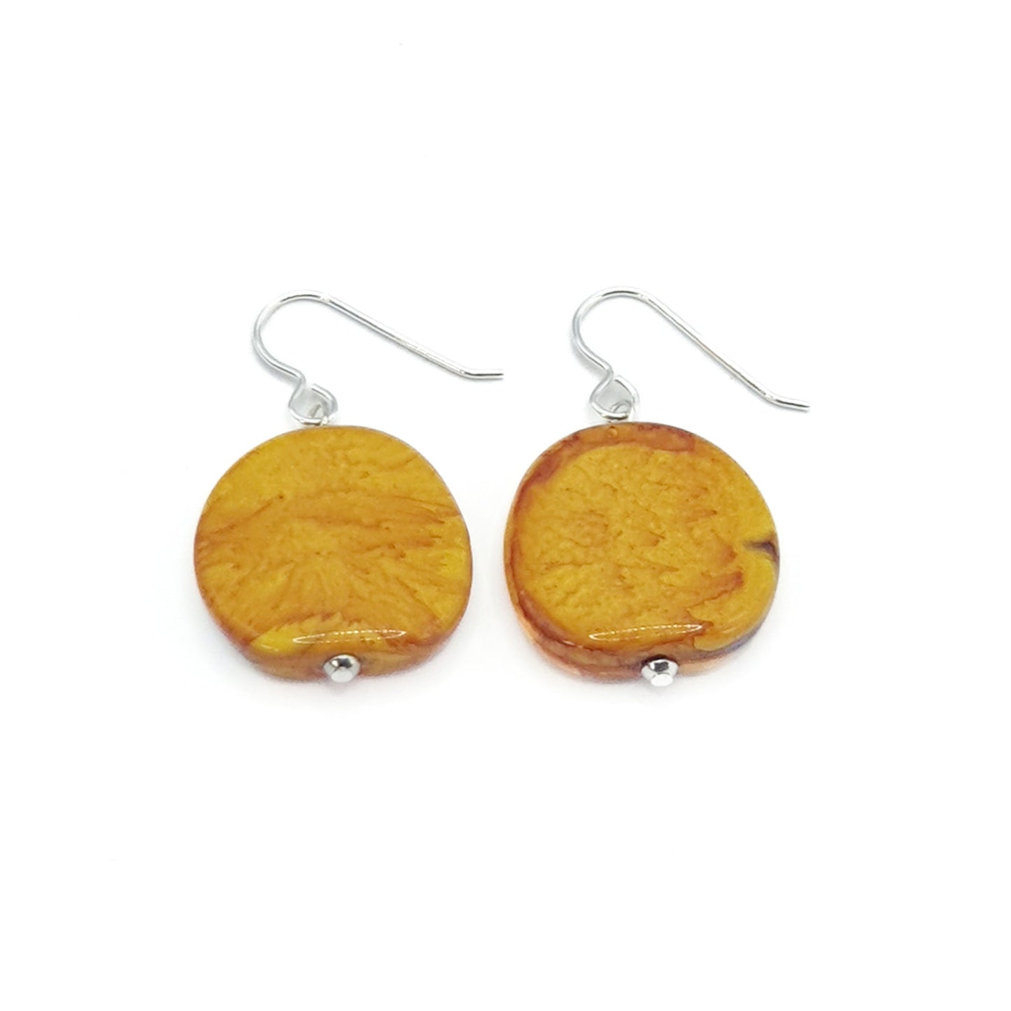Resin pebble earrings in mustard yellow