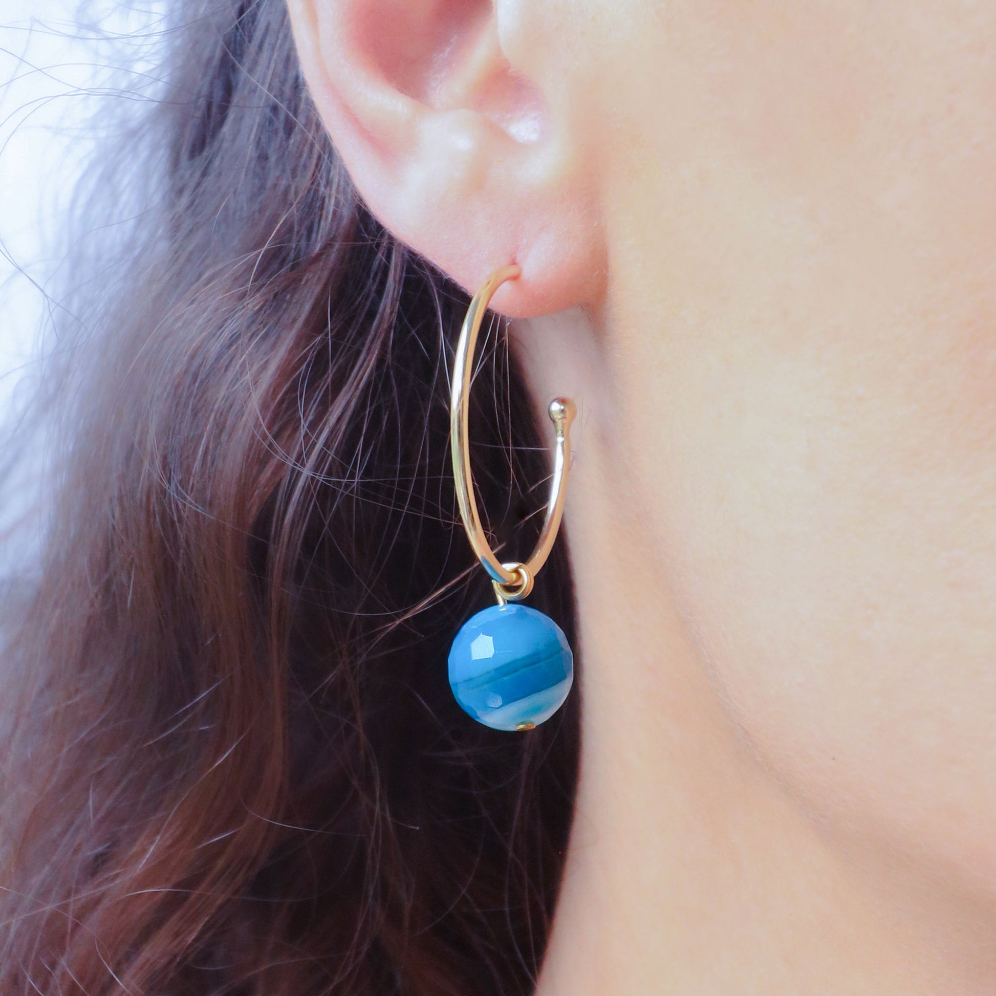 Blue faceted fire agate on 30mm gold plated hoop
