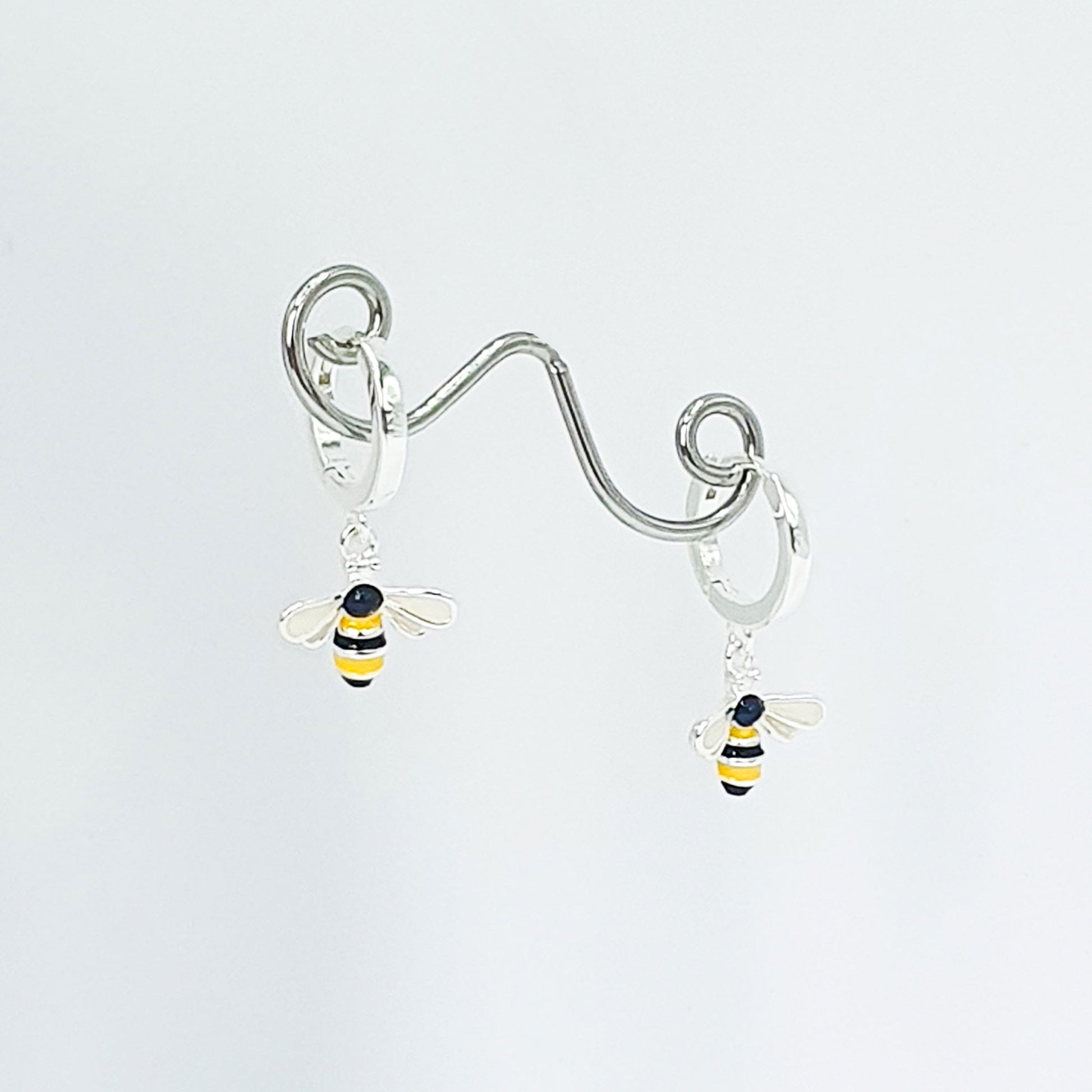 Black & yellow enamelled bees on silver plated hoops