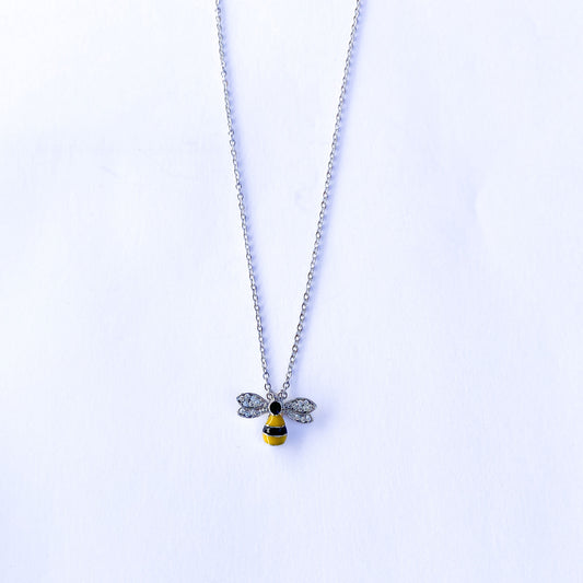 Yellow and black enamelled bee on a chain
