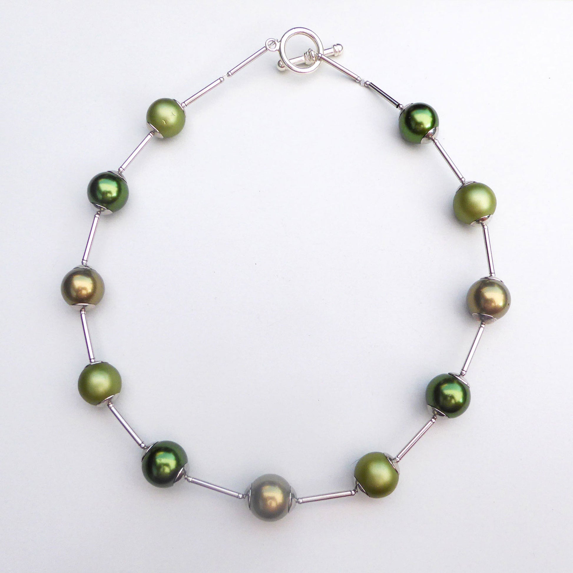 Glass pearl orb-style necklace in shades of green
