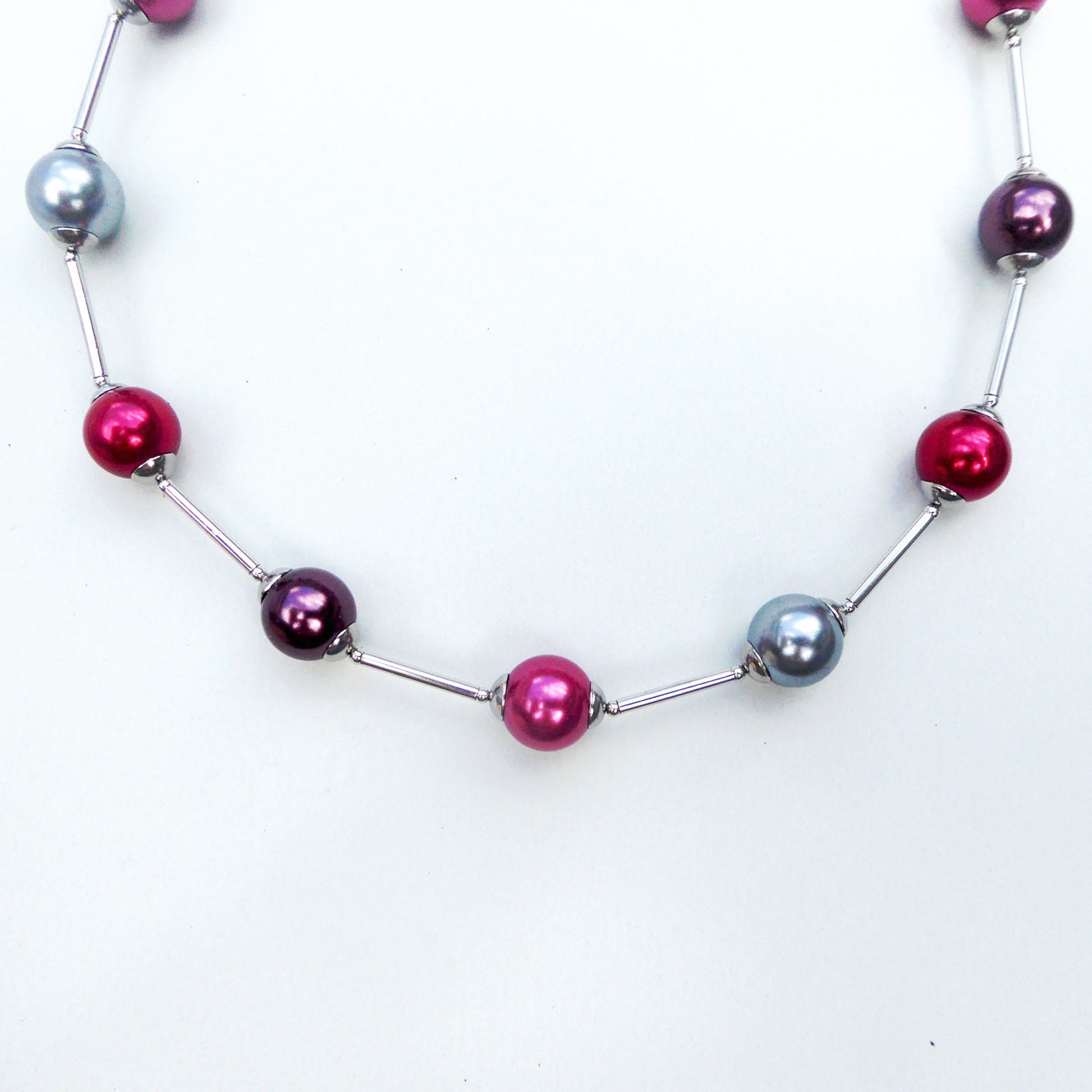 Glass pearl orb-style necklace in reds and grey