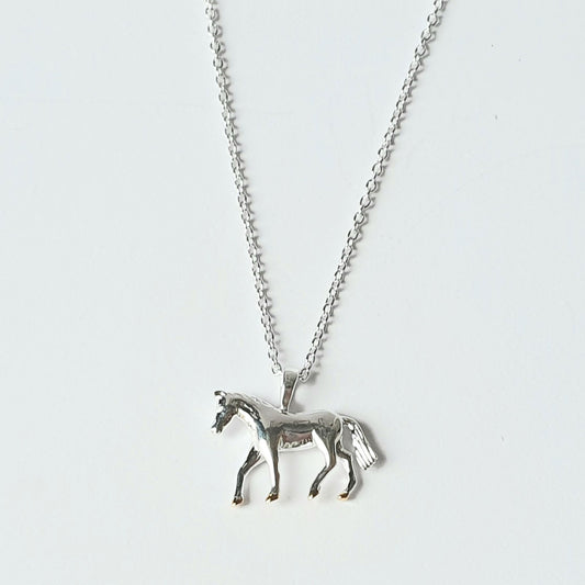 Sterling silver horse with gold vermeil hooves