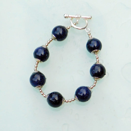 Blue goldstone orb bracelet
