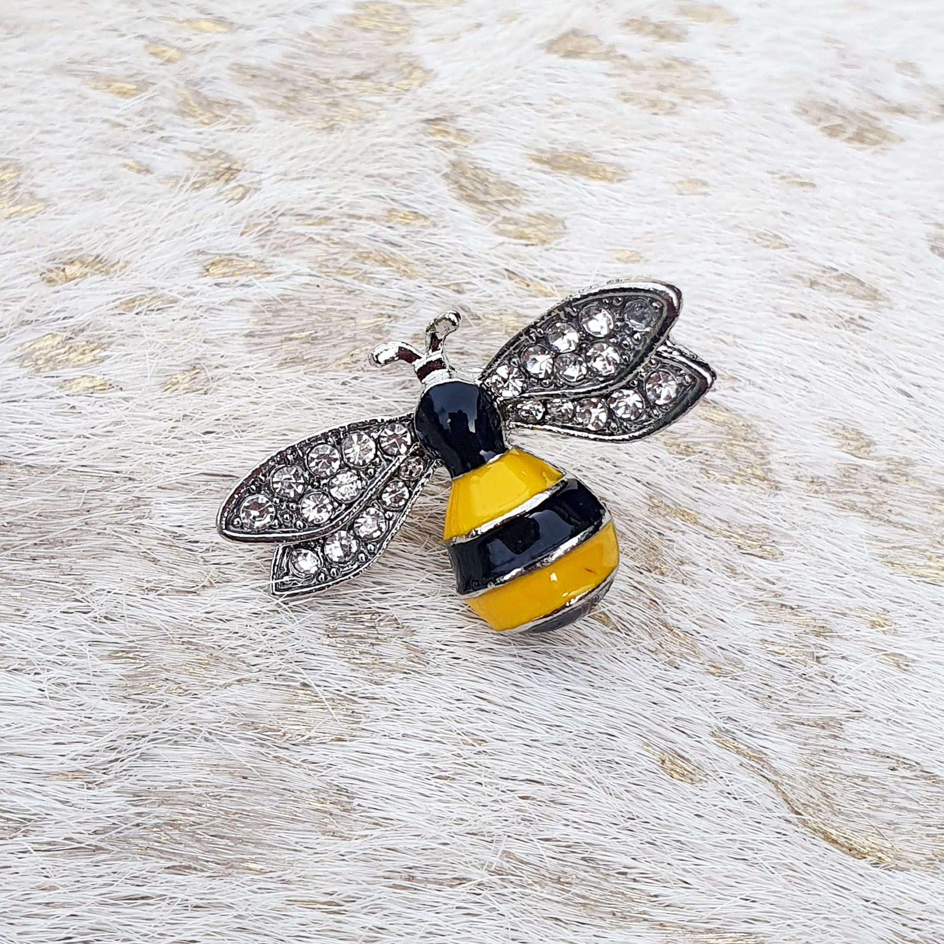 Enamel bee pin with a push-on clasp fitting