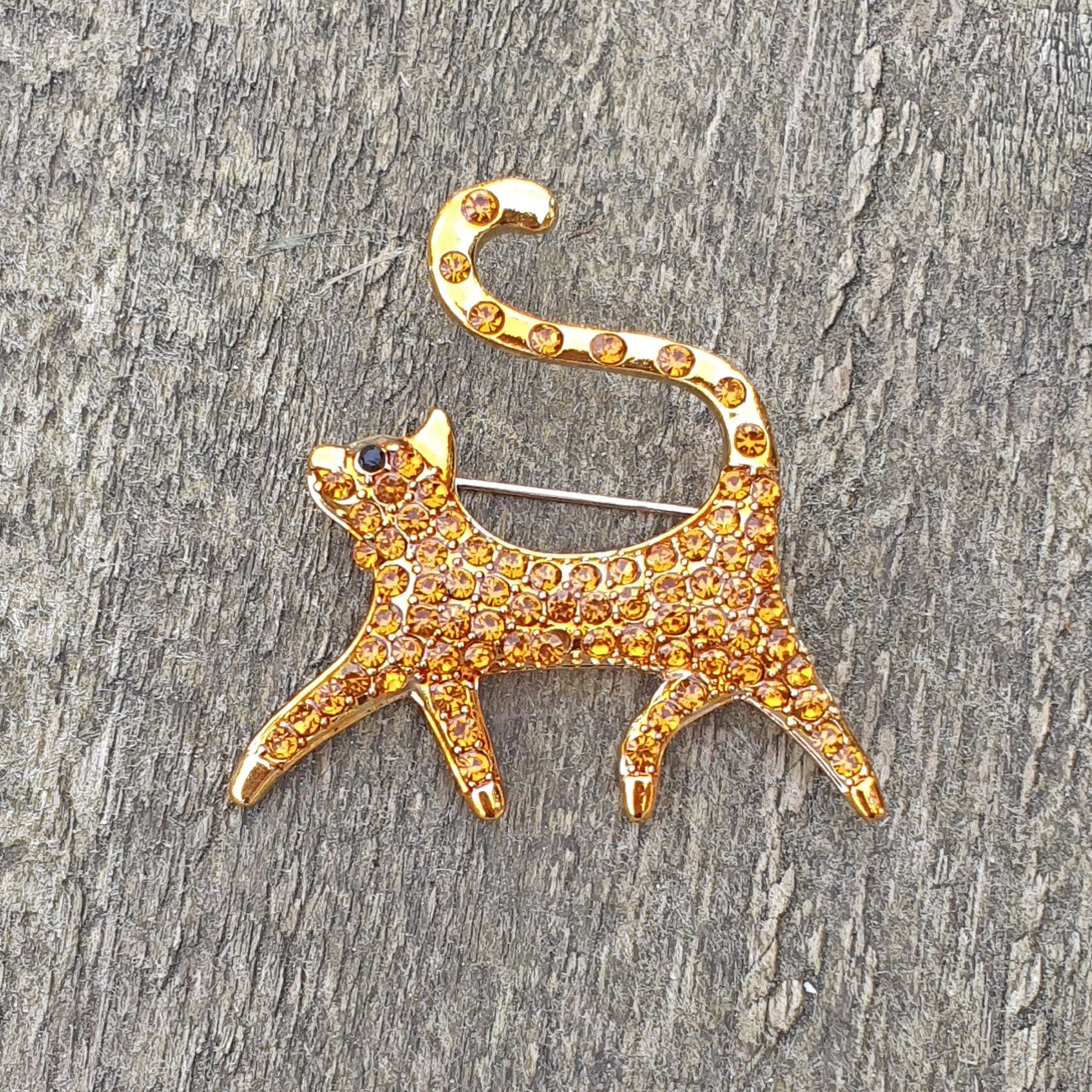 Gold diamante cat brooch