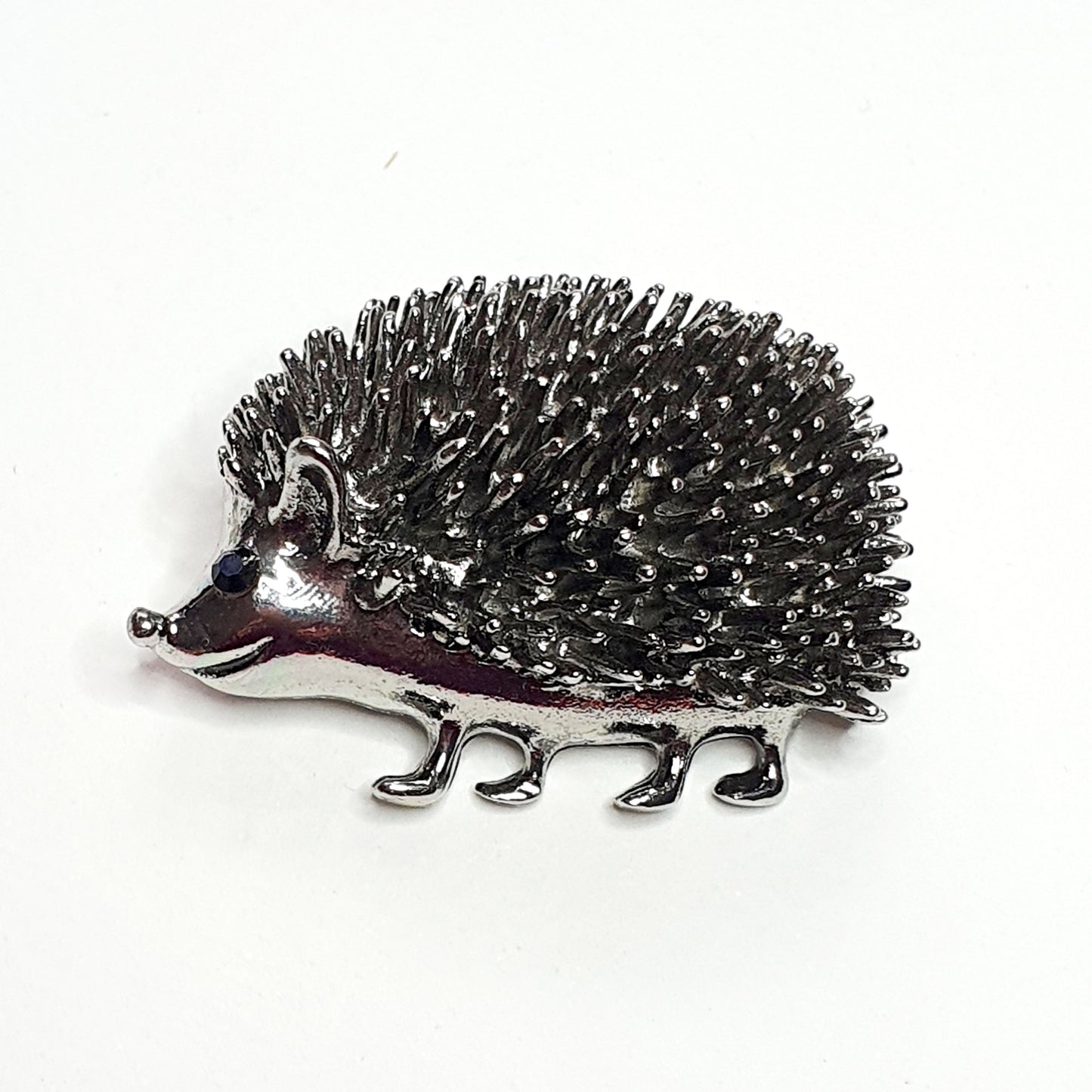 Metal hedgehog brooch