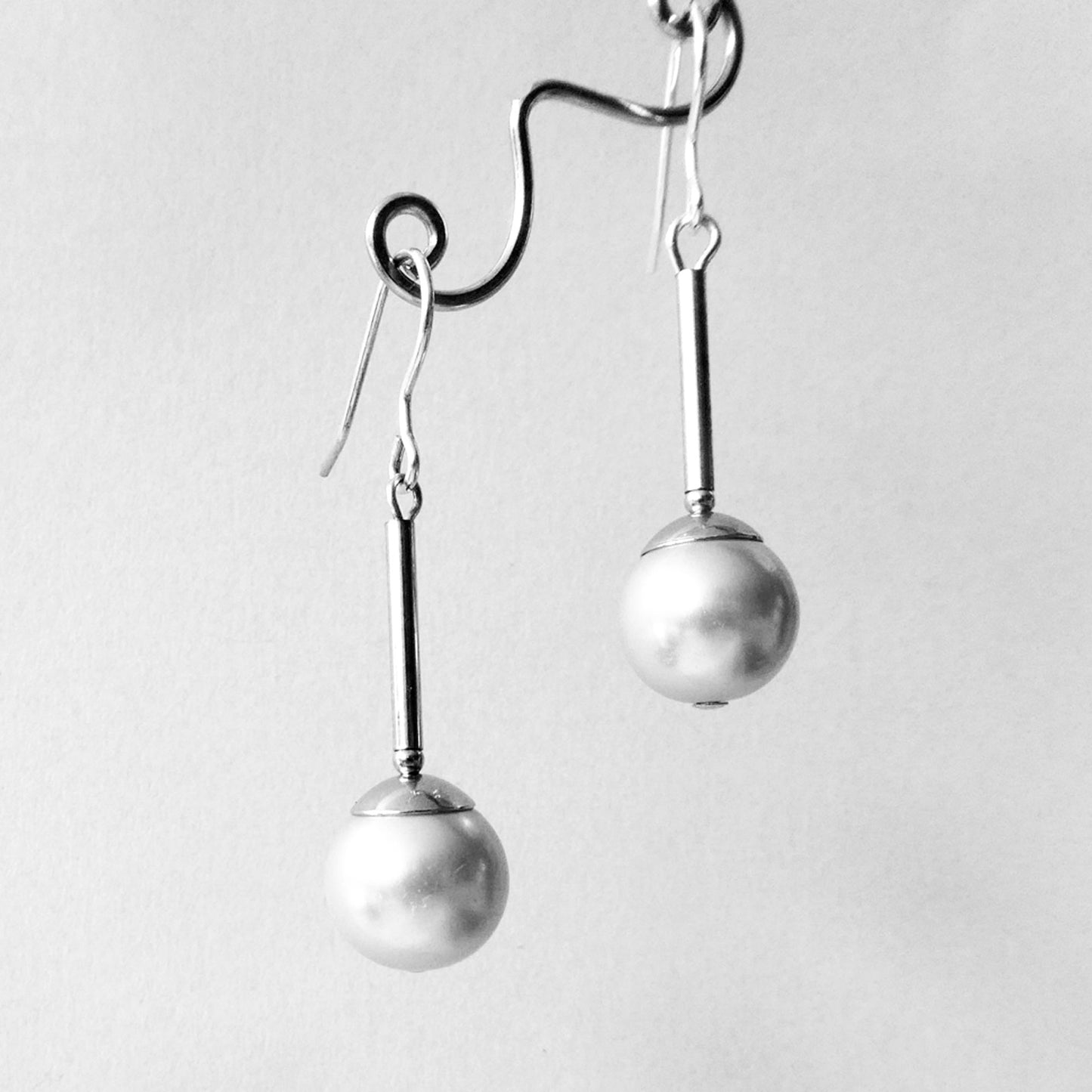 Grey glass pearl long drop earrings
