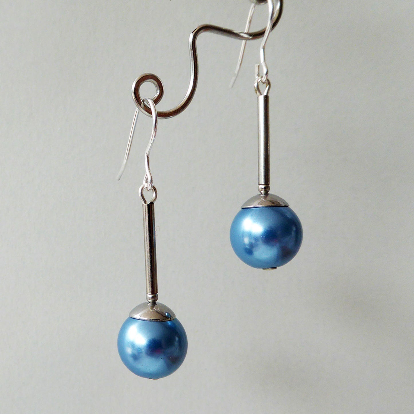 Mid-blue glass pearl long drop earrings