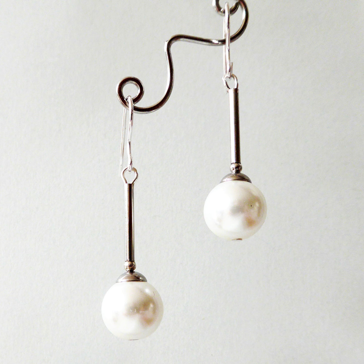 White glass pearl long drop earrings