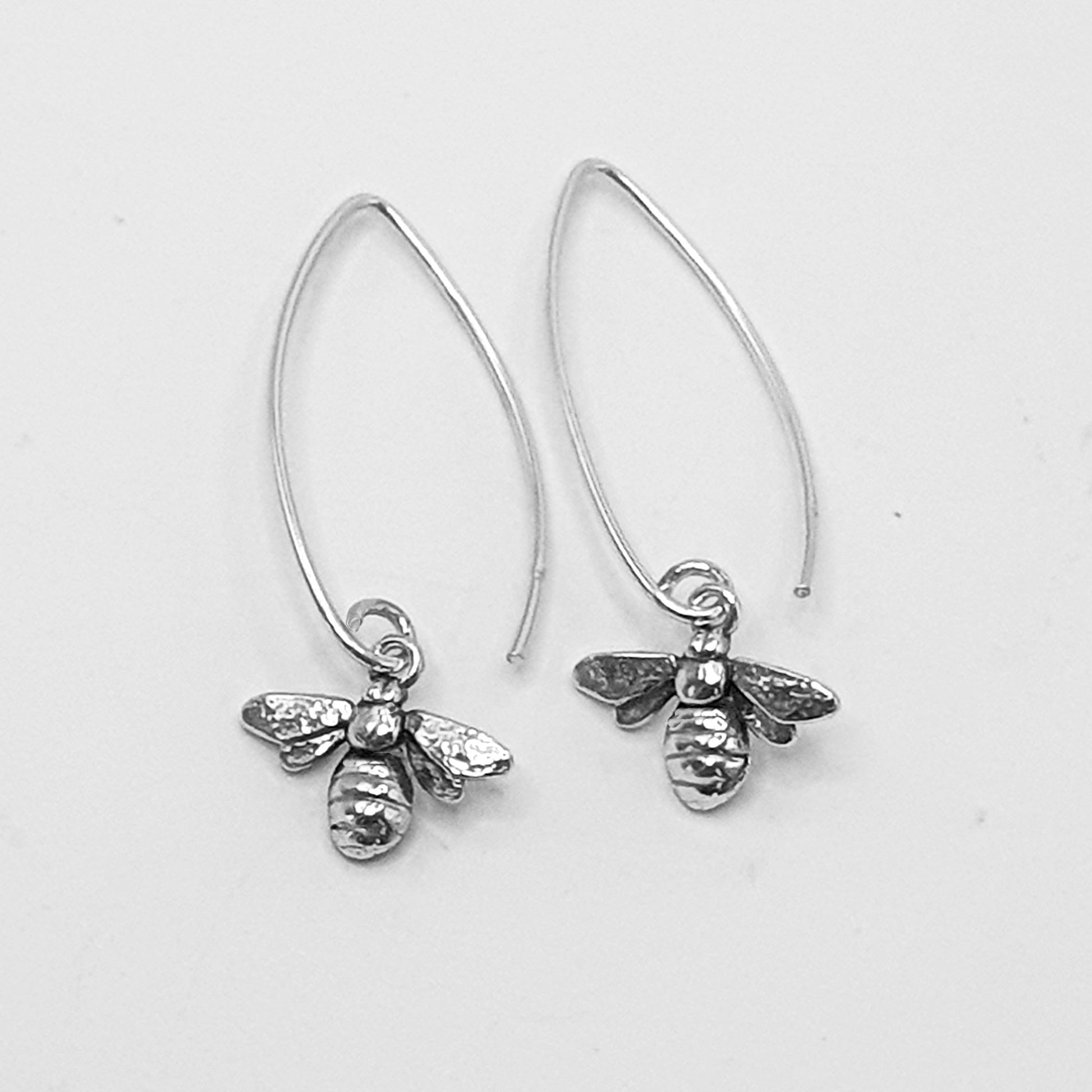 Sterling silver bees on a long oval ear wire