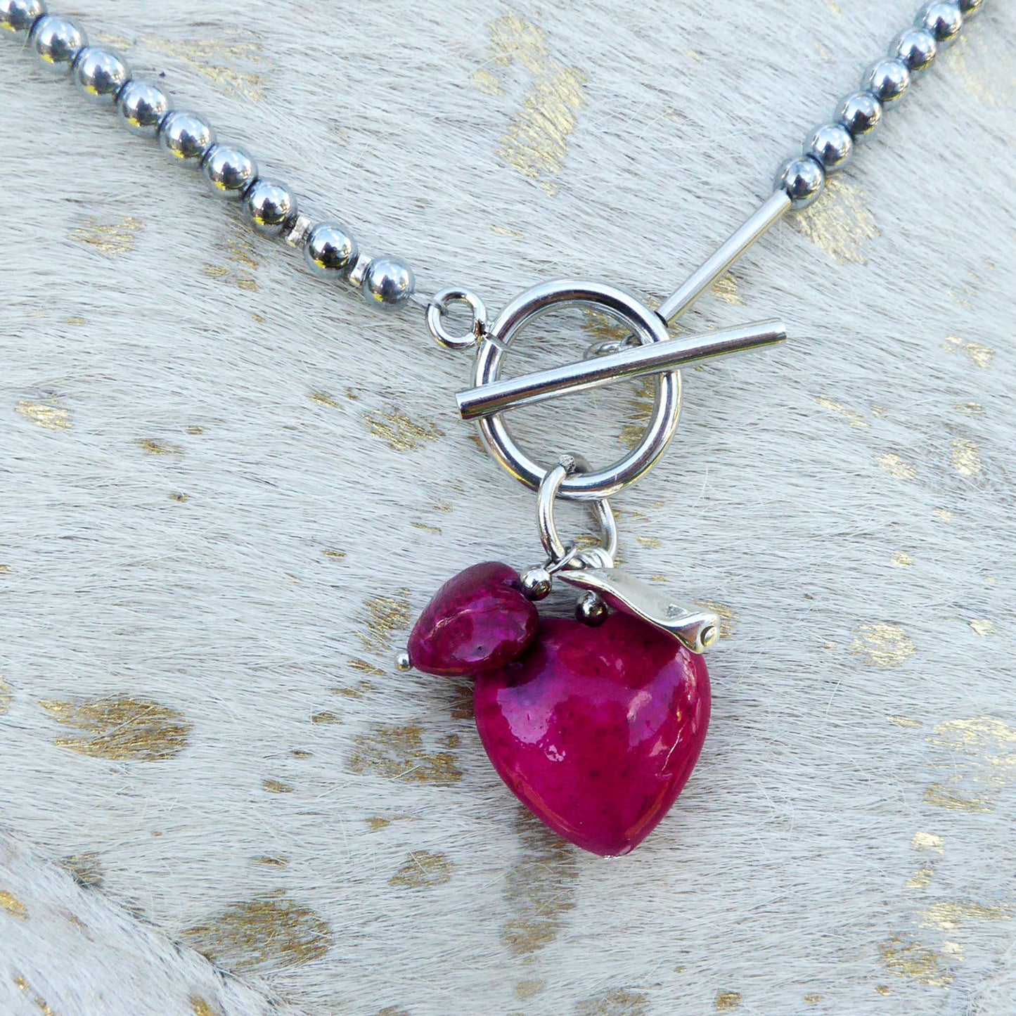 Cerise fossil stone charms necklace