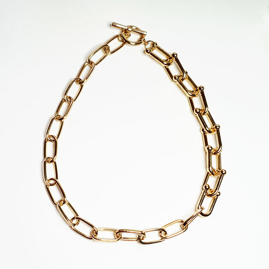 A striking necklace of large gold plated links.